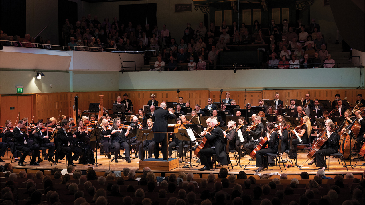 NSO - Full orchestra in concert dress photographed from the stalls